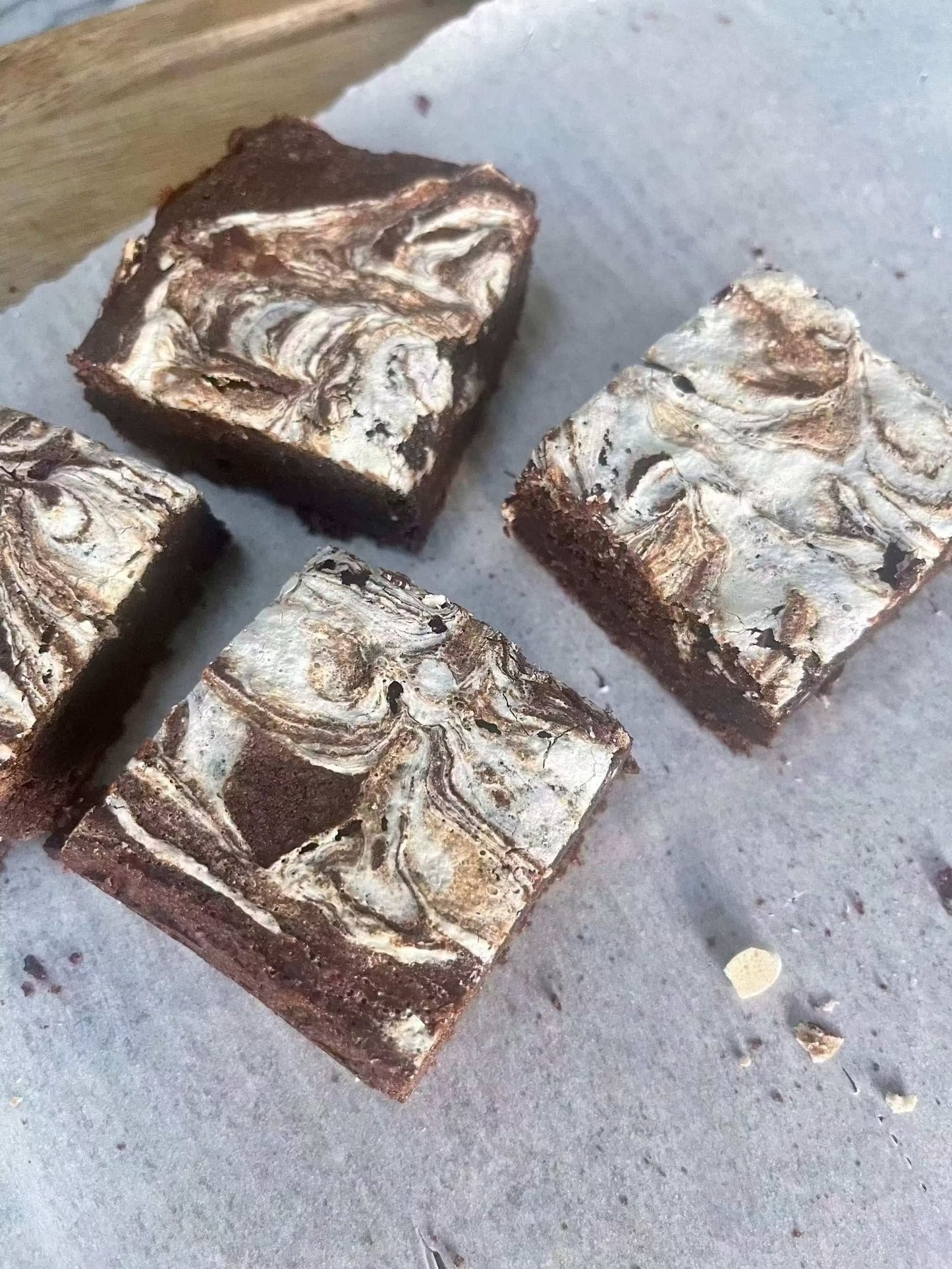 Close-up of gooey Marshmallow Swirl Brownie with white marshmallow swirl and rich cocoa texture