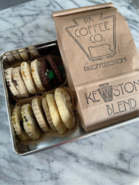 Holiday shortbread assortment and PA Coffee Co. Keystone Blend coffee in a festive tin