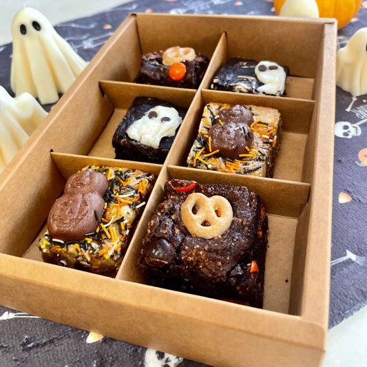 Halloween Brownie 6-Pack featuring decorated brownies with Halloween-themed toppings in a divided box