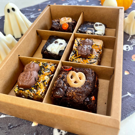 Halloween Brownie 6-Pack featuring decorated brownies with Halloween-themed toppings in a divided box