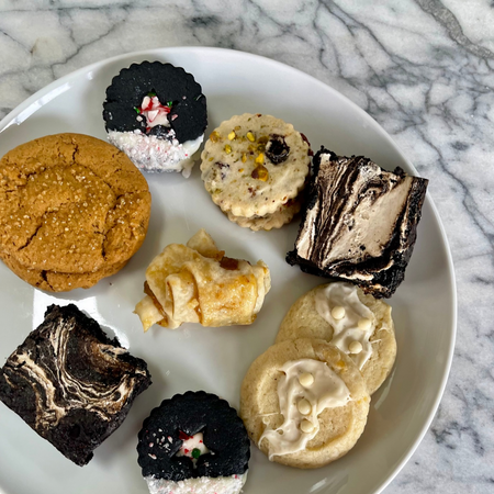 Penn Wynne Presbyterian Holiday Fundraiser box featuring assorted cookies and brownies on white plate