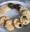 Holiday Shortbread and Coffee Tin assortment with various flavored shortbread cookies arranged on a white plate