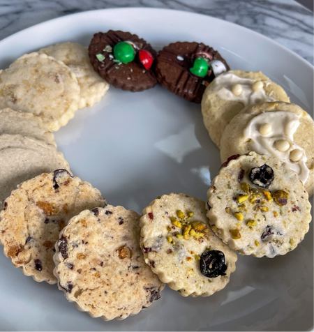 Holiday Shortbread and Coffee Tin assortment with various flavored shortbread cookies arranged on a white plate
