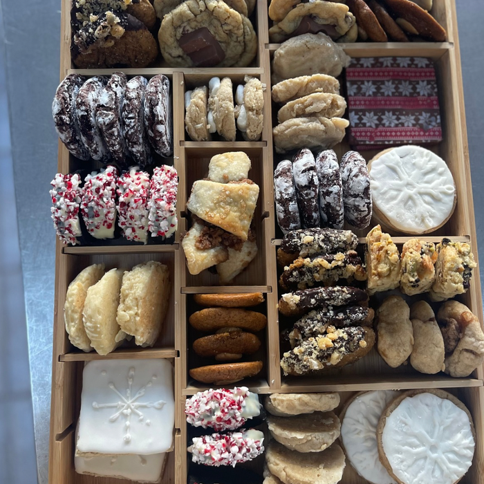 Box o’ Joy holiday cookie box in bamboo tray with assorted festive and seasonal cookies