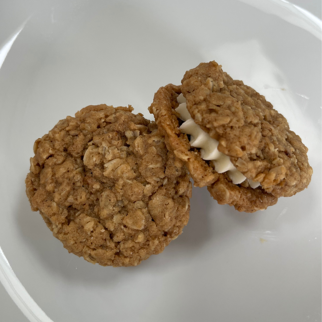 Oatmeal sandwiches with salted maple buttercream filling in a box of six