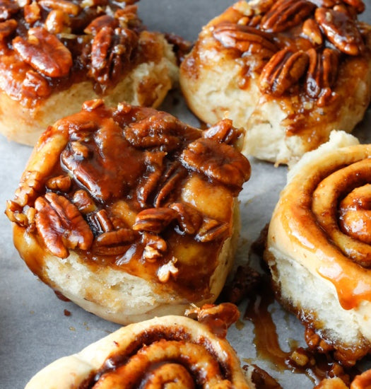 Box of 4 tender maple pecan buns with orange cardamom cinnamon swirl