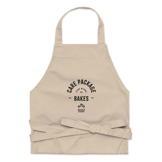 CPB Organic Cotton Apron with adjustable straps and large front pockets, made of 100% organic cotton